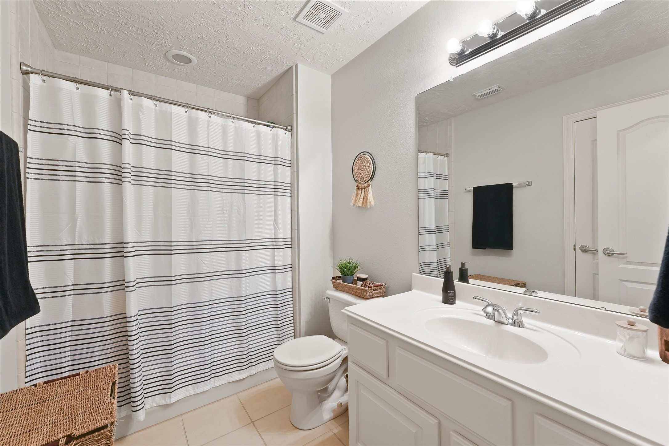 2818 Shallow Springs Court Manvel, TX 77578 - Photo 26 of 41 a bathroom with a sink toilet and shower