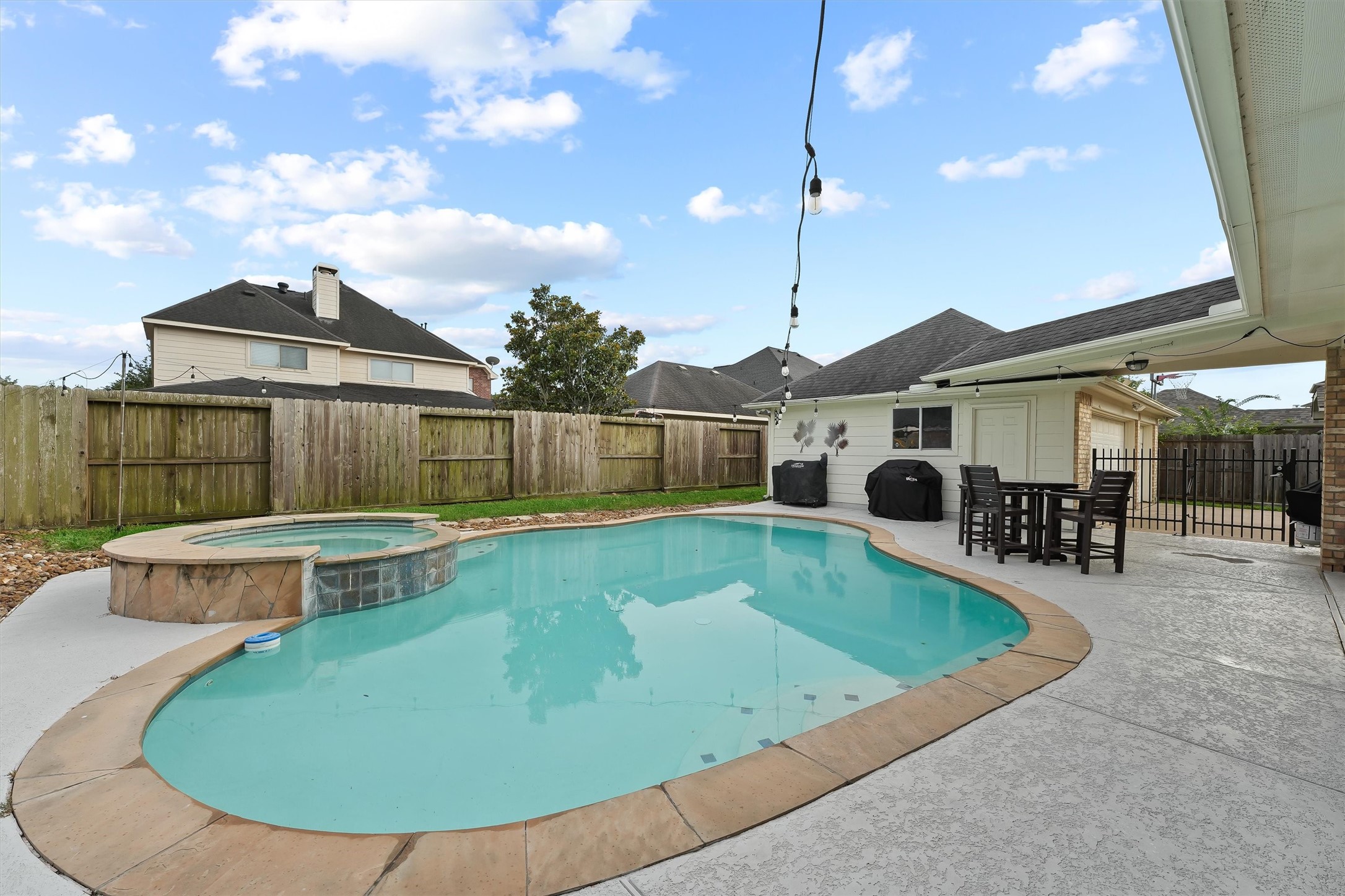 2818 Shallow Springs Court Manvel, TX 77578 - Photo 35 of 41 a view of a house with a swimming pool