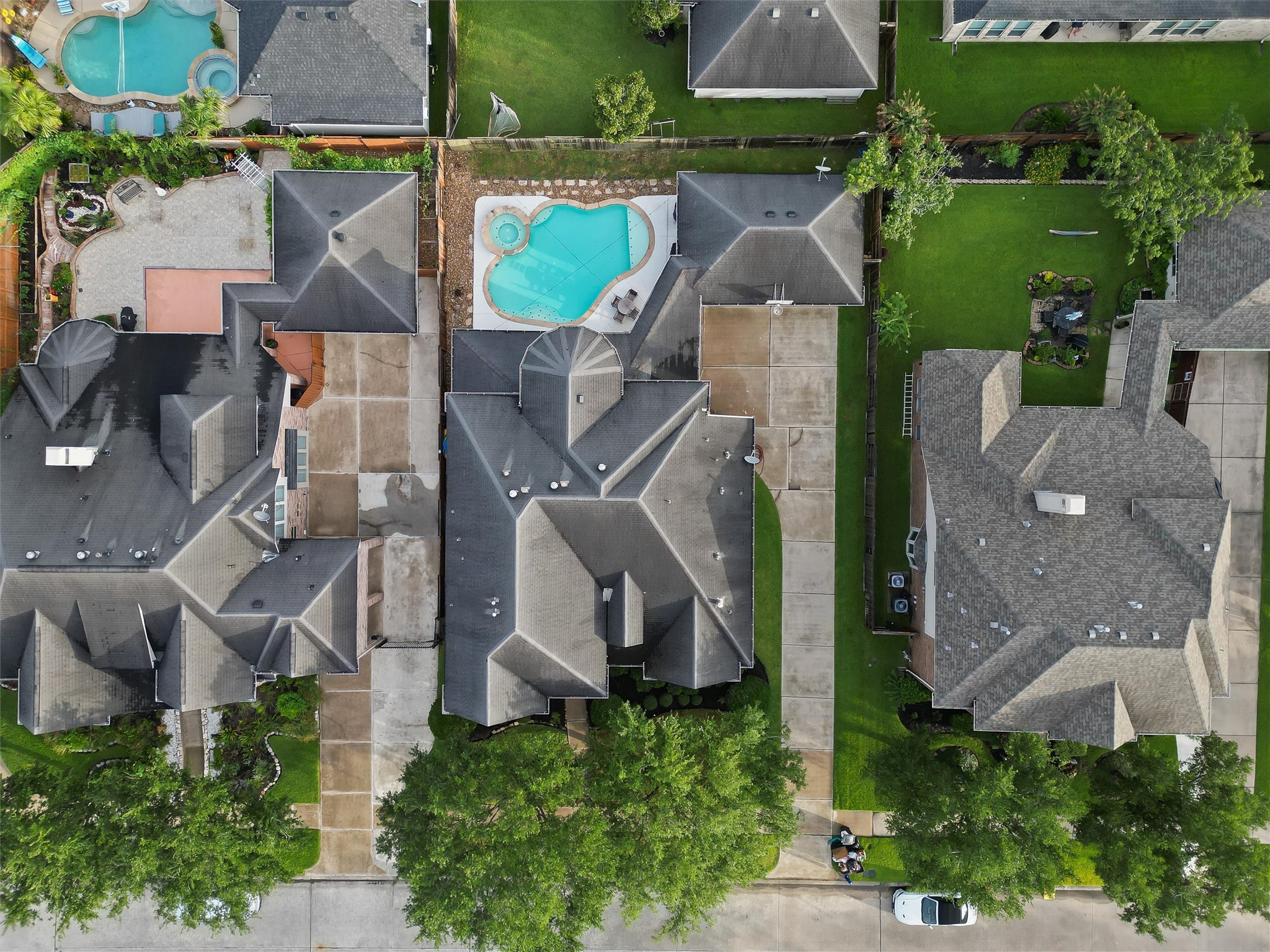 2818 Shallow Springs Court Manvel, TX 77578 - Photo 40 of 41 an aerial view of a house with a garden and a car parked