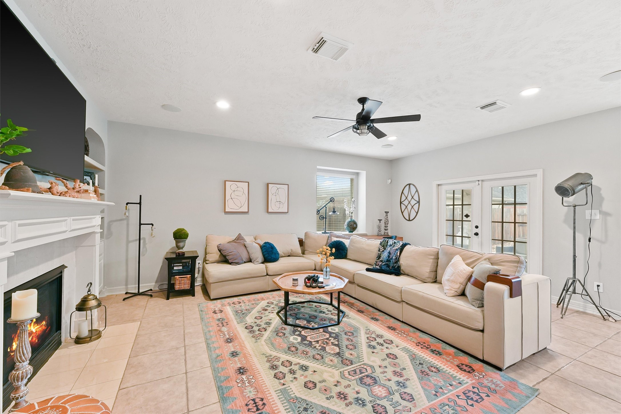 2818 Shallow Springs Court Manvel, TX 77578 - Photo 9 of 41 a living room with furniture and a fireplace