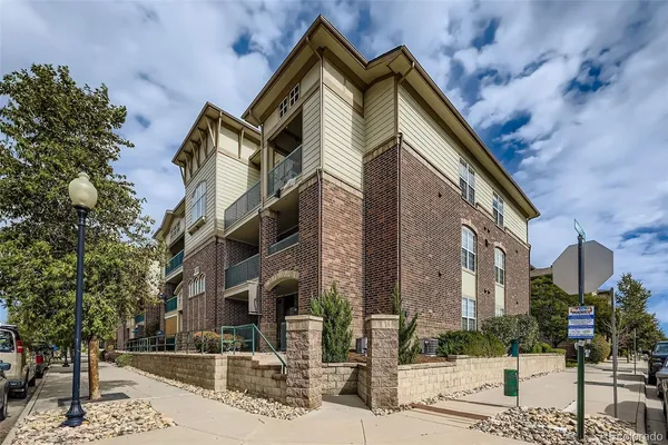 a front view of a building with street view