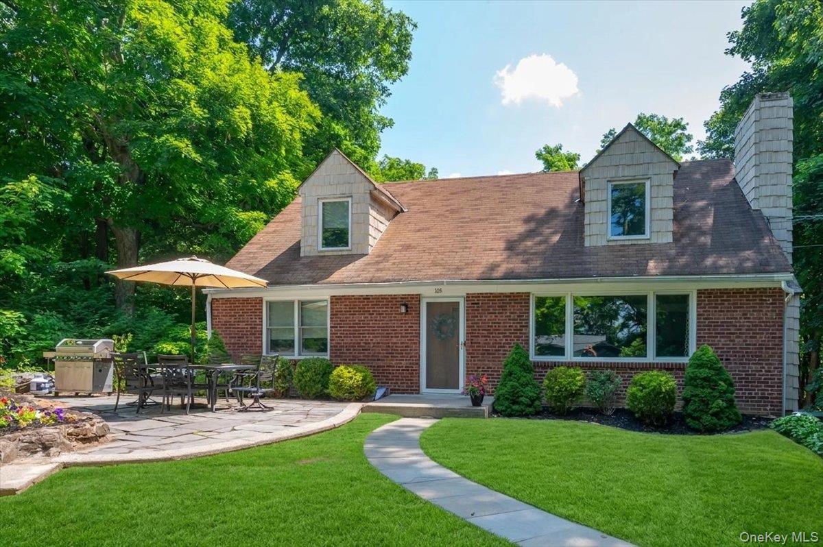 105 High St Extension Mount Kisco, NY 10549 - Photo 2 of 38 a view of a house with a yard and sitting area