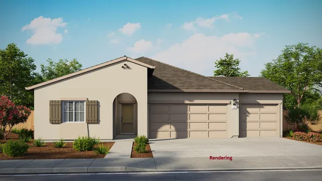 a view of a white house with large windows and potted plants