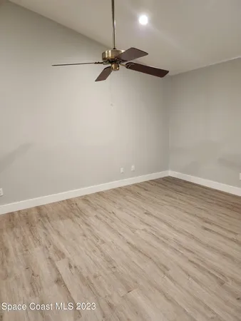 a bathroom with a sink toilet and mirror