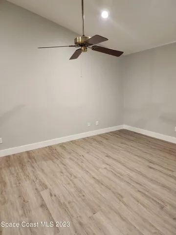 a bathroom with a sink toilet and mirror
