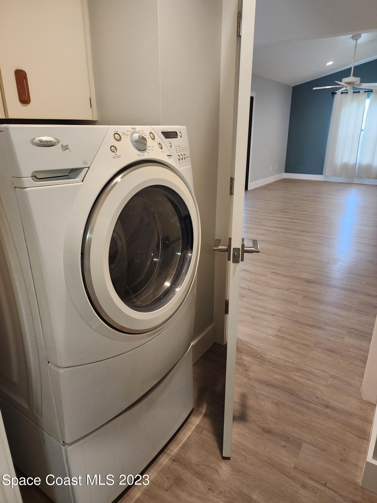 708 Fishtail Palm Boulevard Melbourne, FL 32901 - Photo 32 of 33 a utility room with dryer and washer