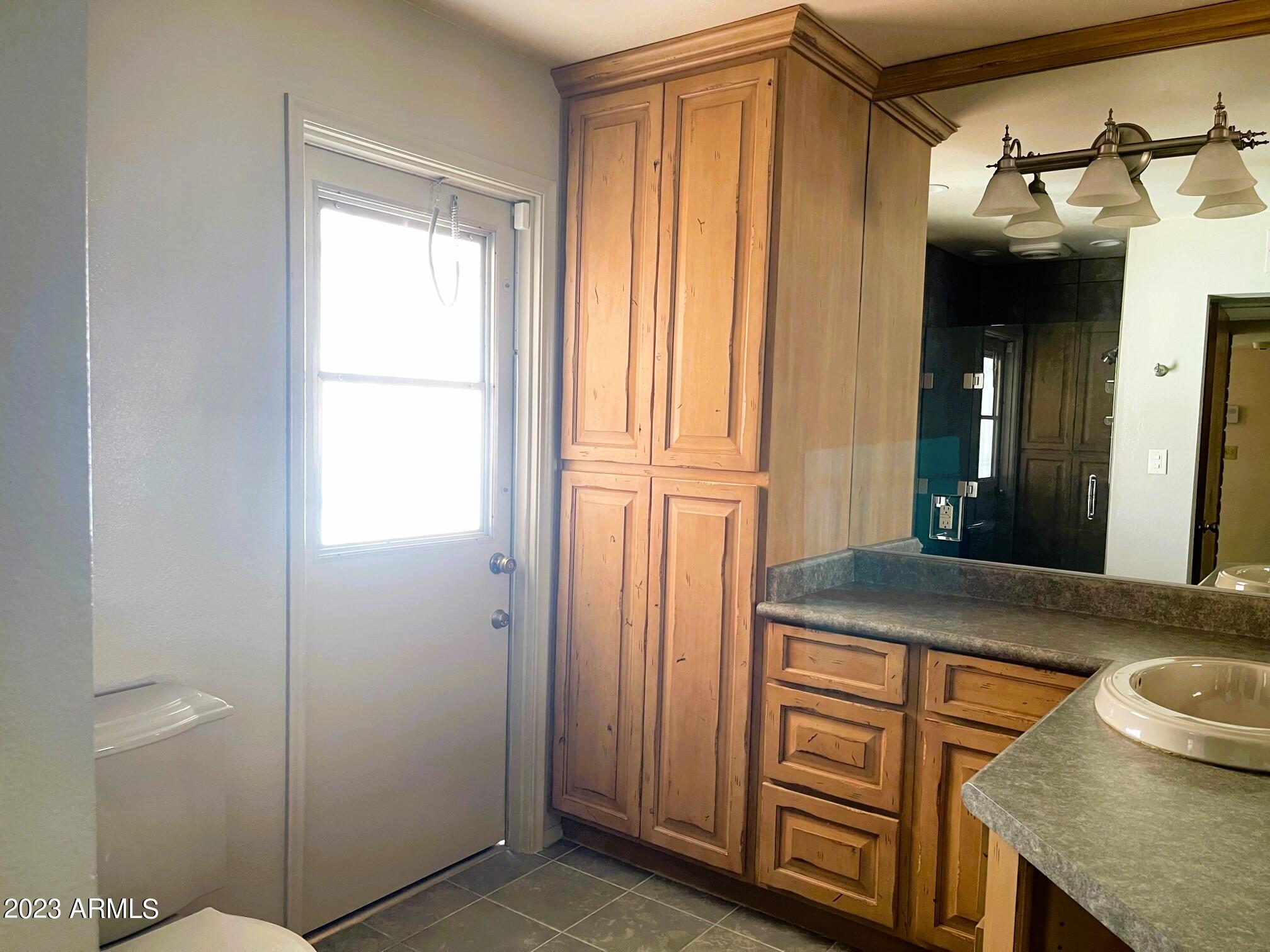4106 West Hatcher Road Phoenix, AZ 85051 - Photo 5 of 8 Updated owner bath with tile work at wal