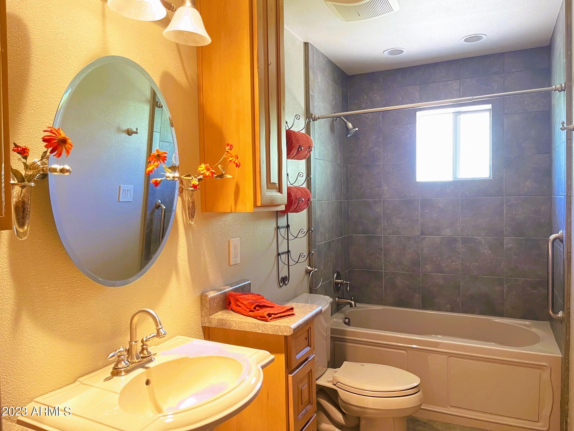 4106 West Hatcher Road Phoenix, AZ 85051 - Photo 6 of 8 Secondary bath - updated tile work and t