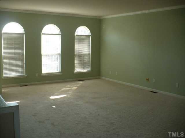 5316 Berry Creek Circle Raleigh, NC 27613 - Photo 4 of 9 a view of empty room with windows