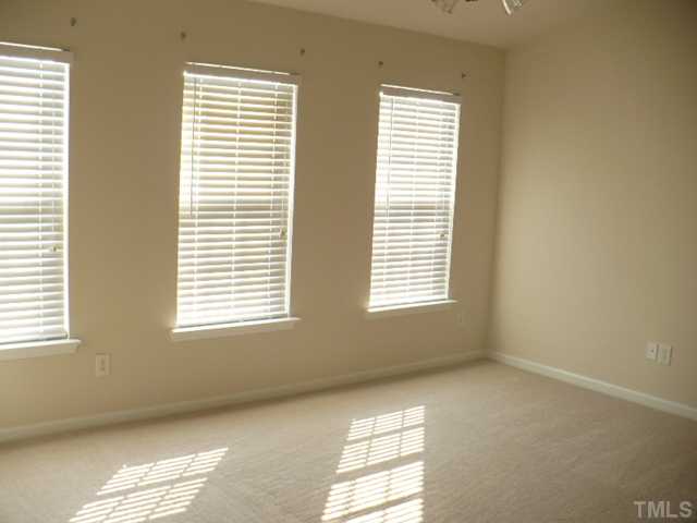 5316 Berry Creek Circle Raleigh, NC 27613 - Photo 9 of 9 a view of an empty room with a window