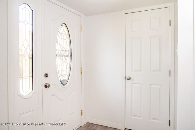 a view of a room with windows