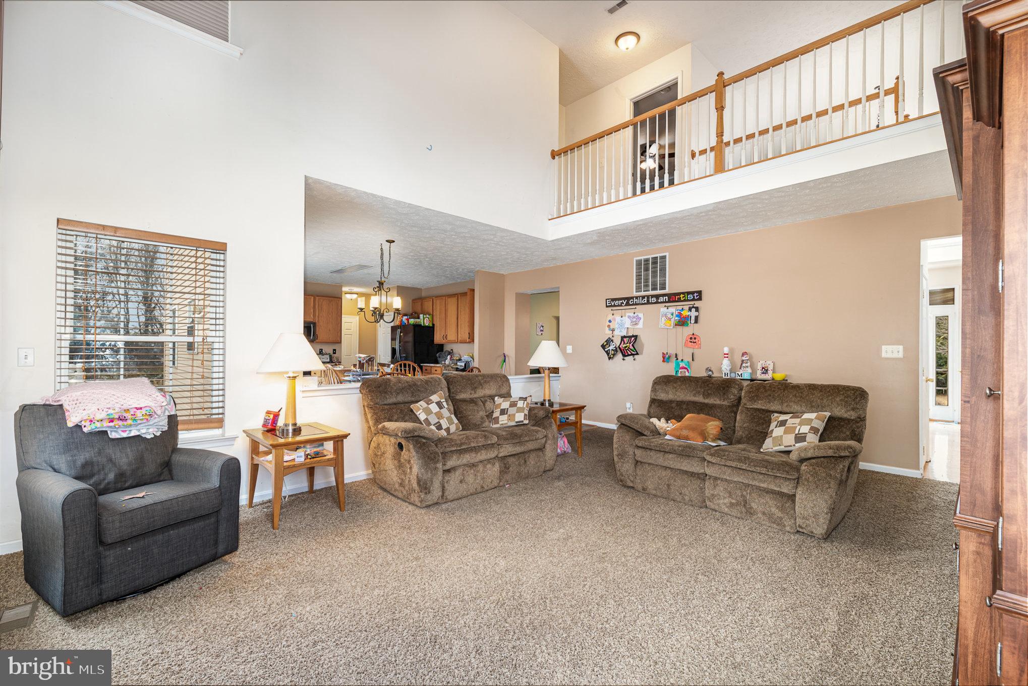 145 West Heather Road Bel Air, MD 21014 - Photo 13 of 47 a living room with furniture and a large window