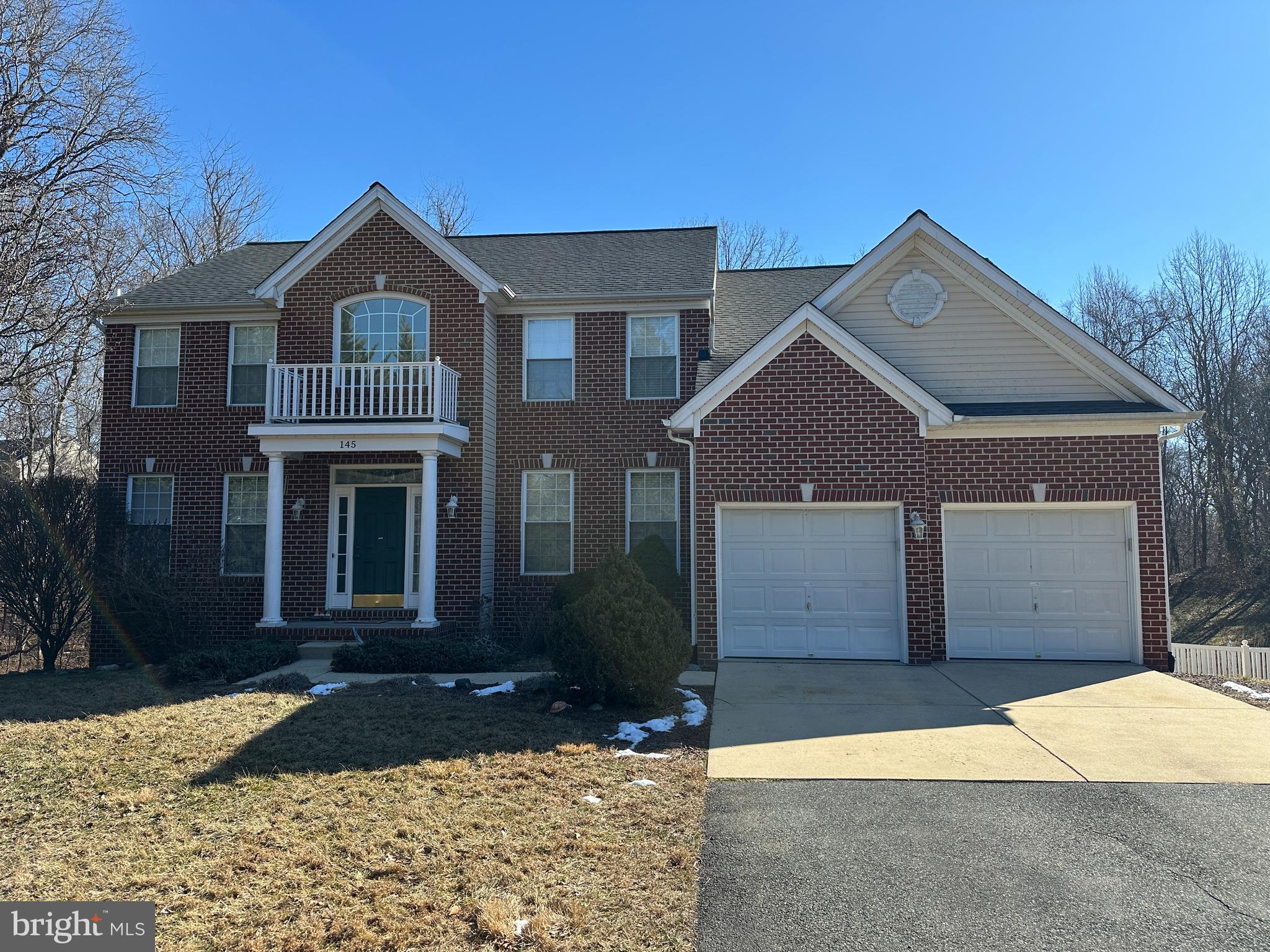 145 West Heather Road Bel Air, MD 21014 - Photo 2 of 47 a front view of a house with a yard and garage