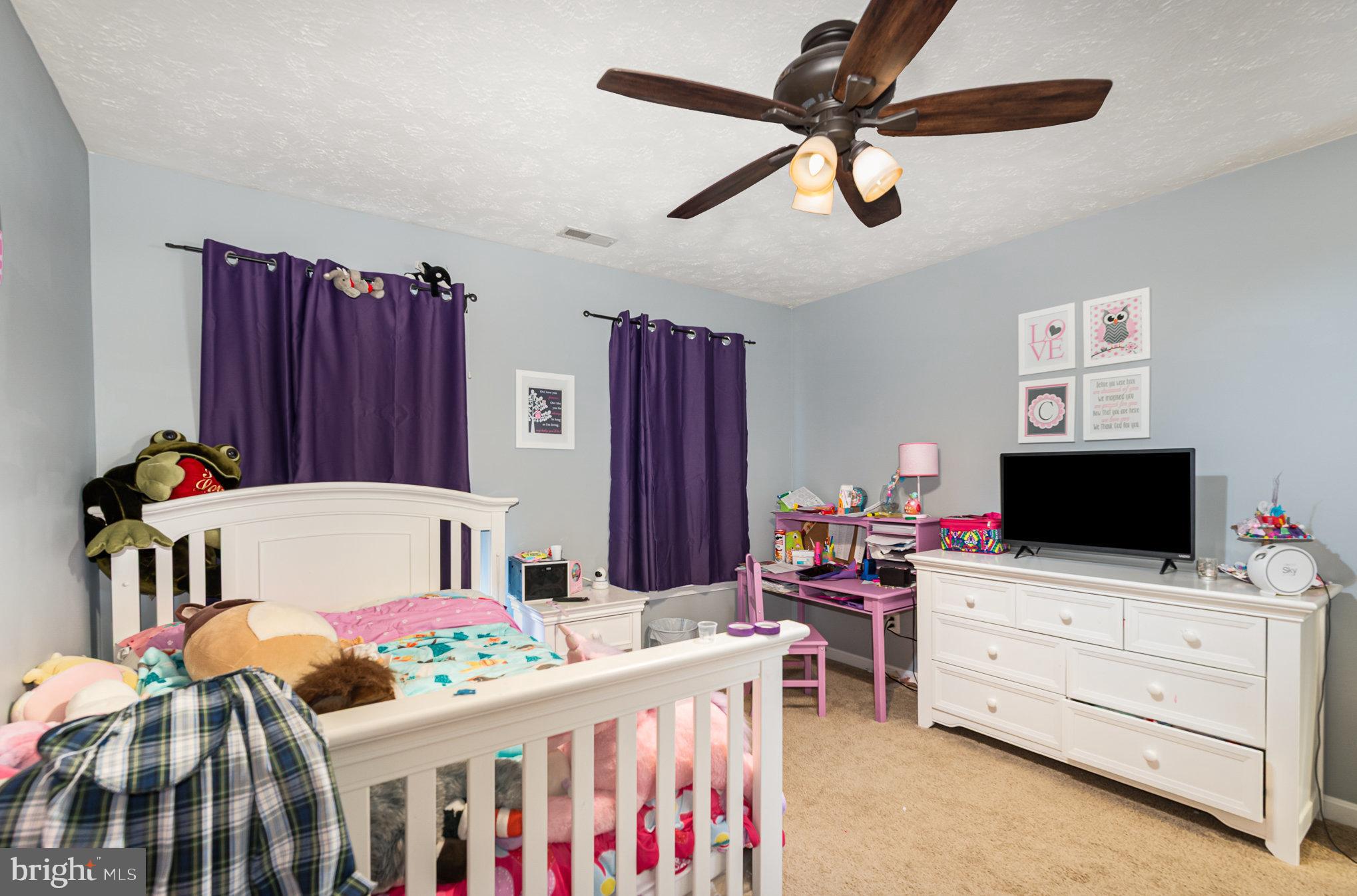 145 West Heather Road Bel Air, MD 21014 - Photo 32 of 47 a bedroom with furniture and a flat screen tv
