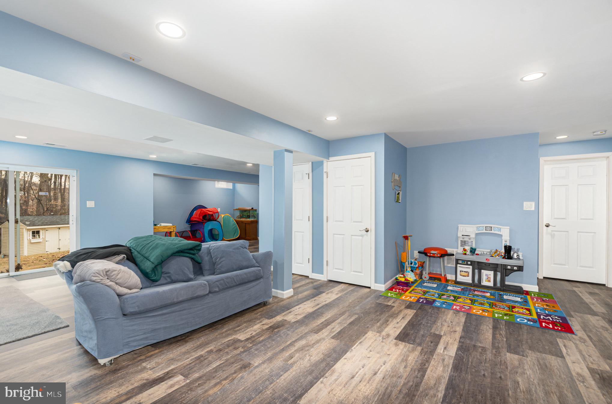 145 West Heather Road Bel Air, MD 21014 - Photo 37 of 47 a living room with furniture and a wooden floor
