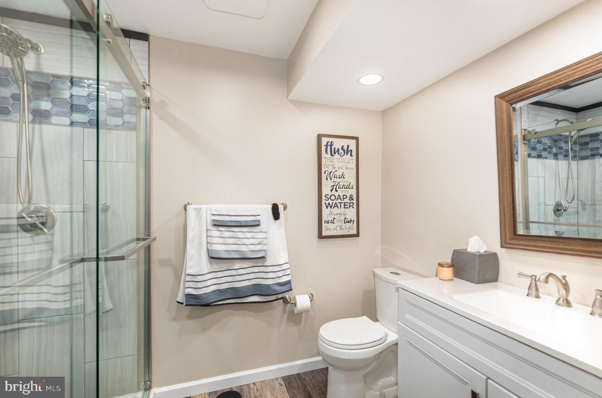 145 West Heather Road Bel Air, MD 21014 - Photo 39 of 47 a bathroom with a sink a toilet and shower