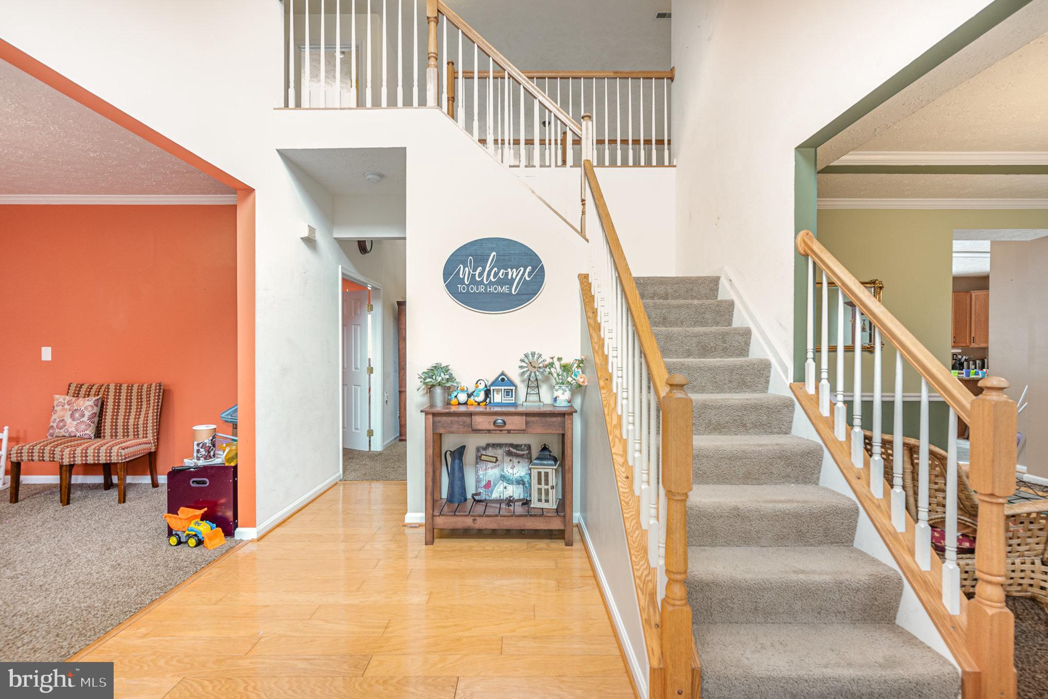 145 West Heather Road Bel Air, MD 21014 - Photo 7 of 47 a view of a hallway with entryway wooden floor and front door