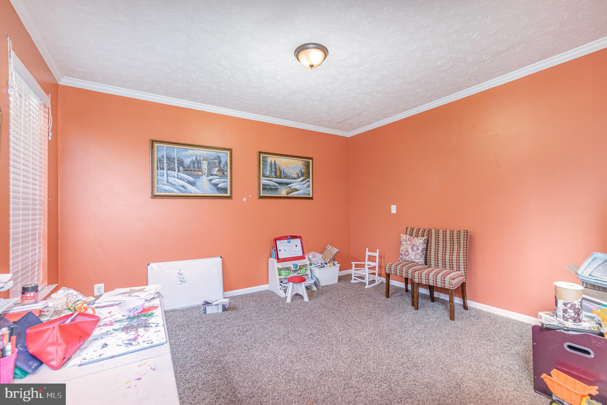 145 West Heather Road Bel Air, MD 21014 - Photo 10 of 47 a bedroom with furniture and a lamp