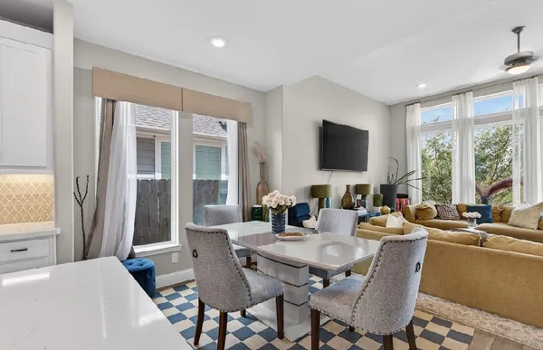 a view of a dining room with furniture window and outside view