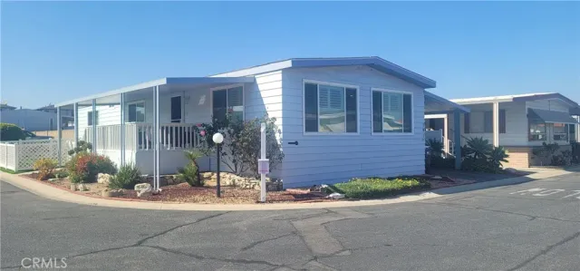 a view of a house with a street