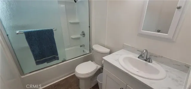 a bathroom with a window a sink and a window