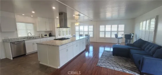 a view of a balcony with chairs