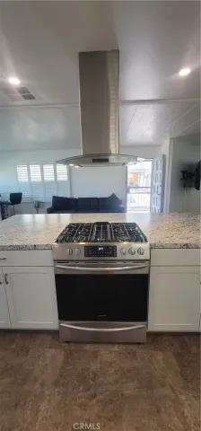 a bathroom with mirror and sink