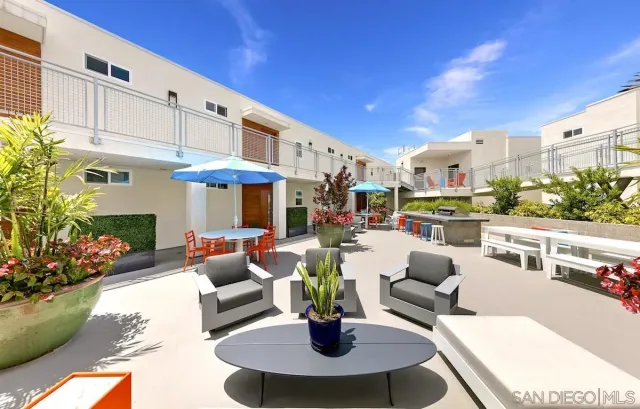 a outdoor living space with furniture and garden view