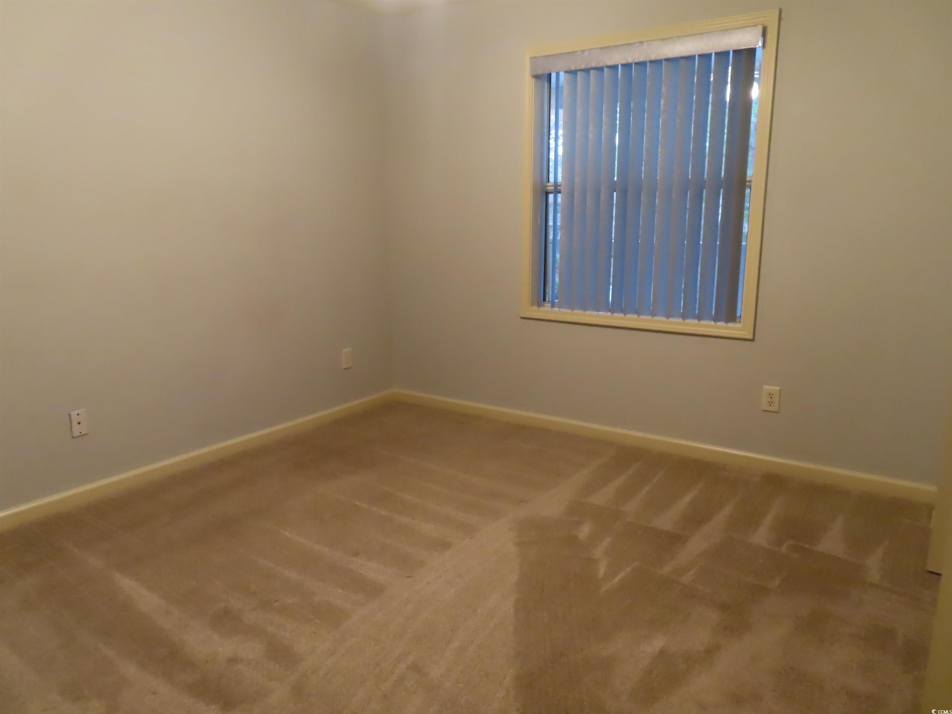 1230 St George Lane, Unit B Myrtle Beach, SC 29588 - Photo 5 of 17 Kitchen with ceiling fan, sink, white appliances,