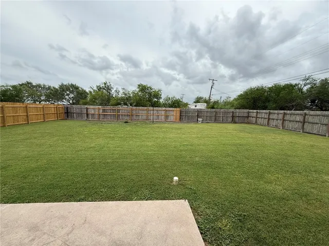 a view of a golf course with a lake