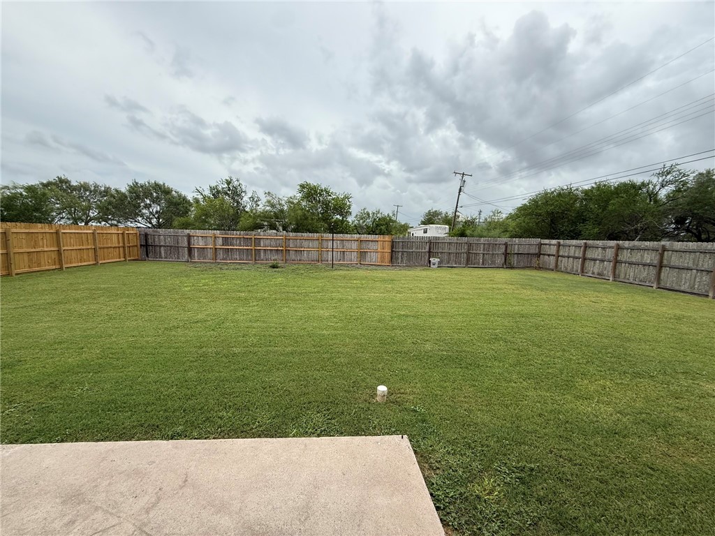 408 North Ave C Bishop, TX 78343 - Photo 11 of 12 a view of a golf course with a lake