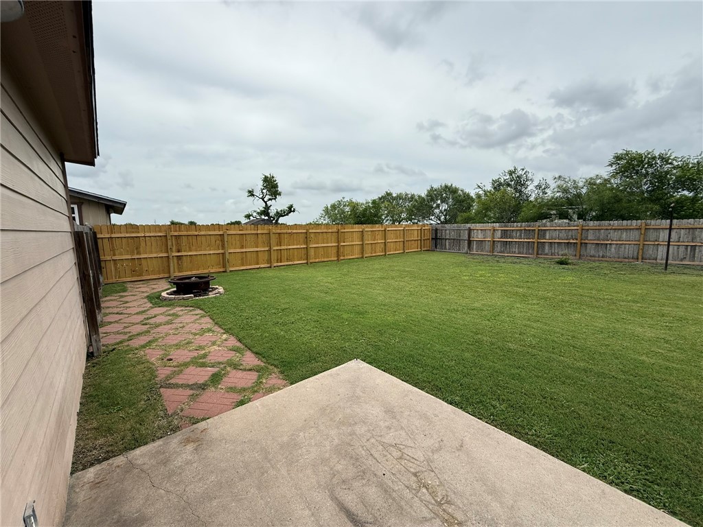408 North Ave C Bishop, TX 78343 - Photo 10 of 12 a view of a golf course with a garden