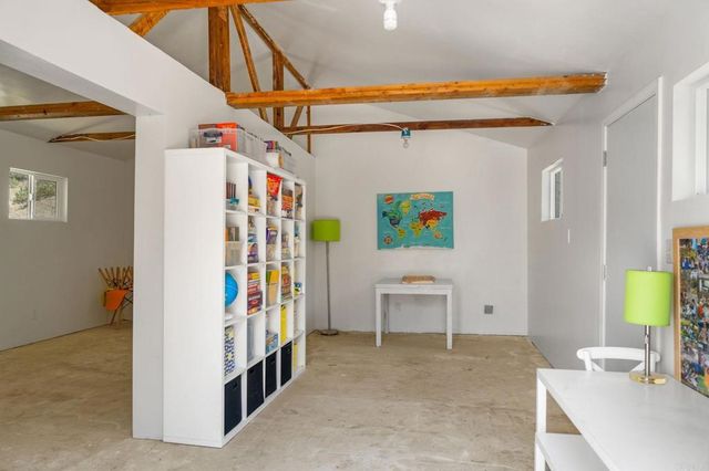 a view of a large building with lots of trees