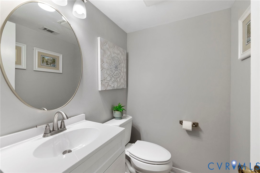 2609 Chancer Drive Henrico, VA 23233 - Photo 11 of 20 1st floor powder room with updated vanity, toilet