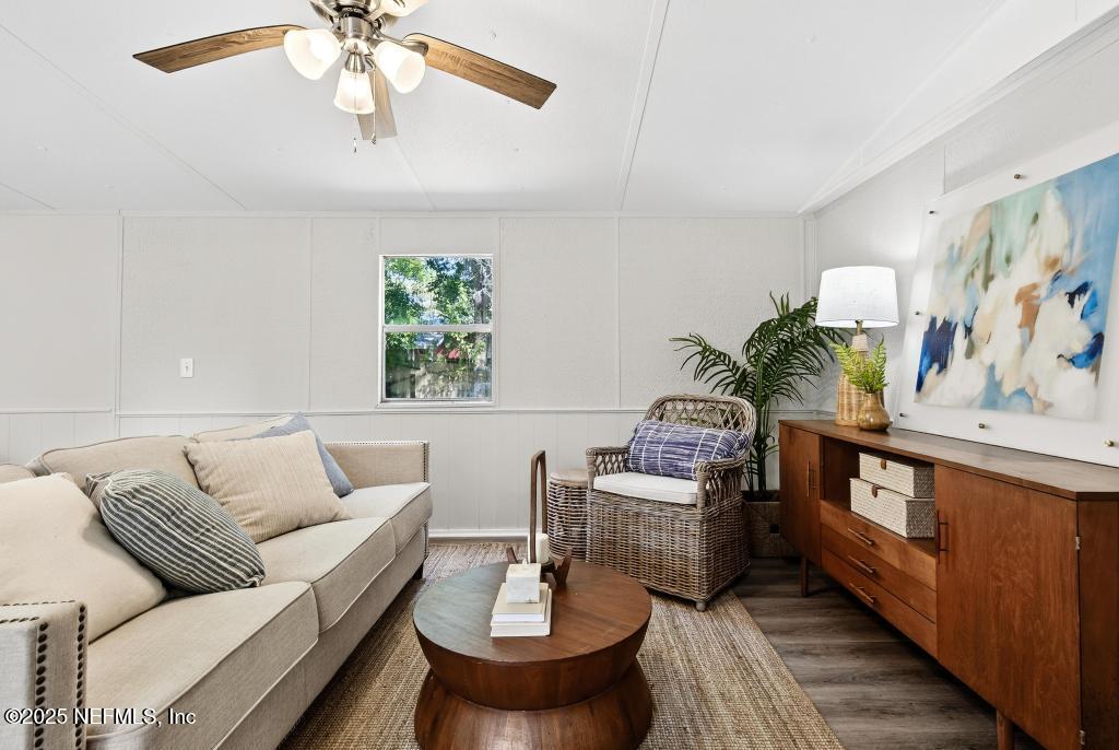 28 Neighbors Cove Road Orange Park, FL 32065 - Photo 13 of 56 a living room with furniture and a rug