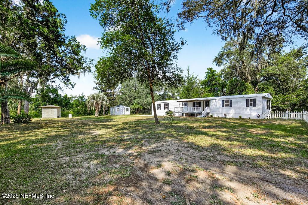 28 Neighbors Cove Road Orange Park, FL 32065 - Photo 2 of 56 a view of a house with a yard