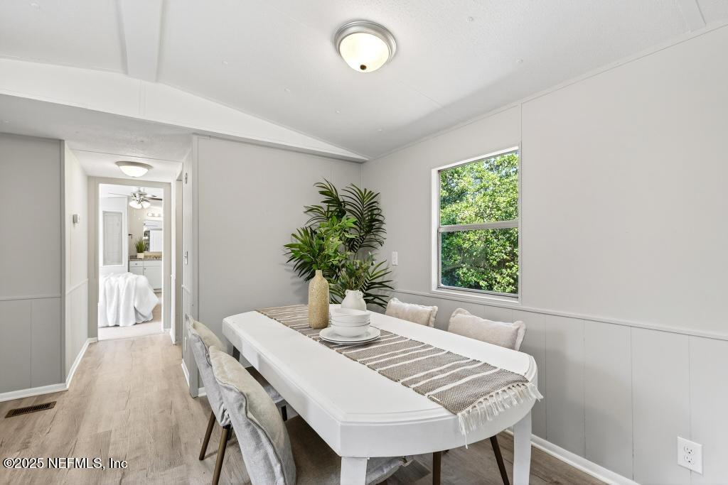28 Neighbors Cove Road Orange Park, FL 32065 - Photo 24 of 56 a view of a dining room with furniture and window