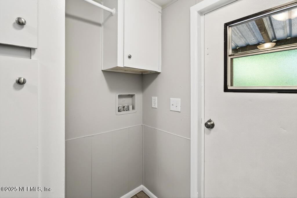 28 Neighbors Cove Road Orange Park, FL 32065 - Photo 28 of 56 a bathroom with a shower and a sink