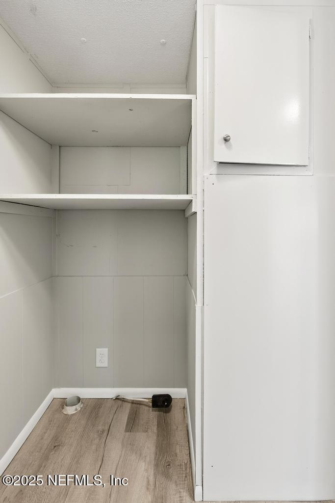 28 Neighbors Cove Road Orange Park, FL 32065 - Photo 30 of 56 a view of an empty walk in closet