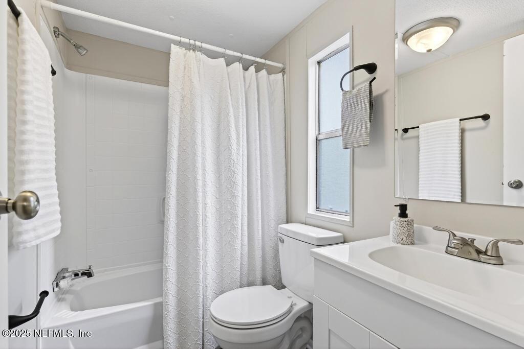 28 Neighbors Cove Road Orange Park, FL 32065 - Photo 46 of 56 a bathroom with a sink toilet and shower