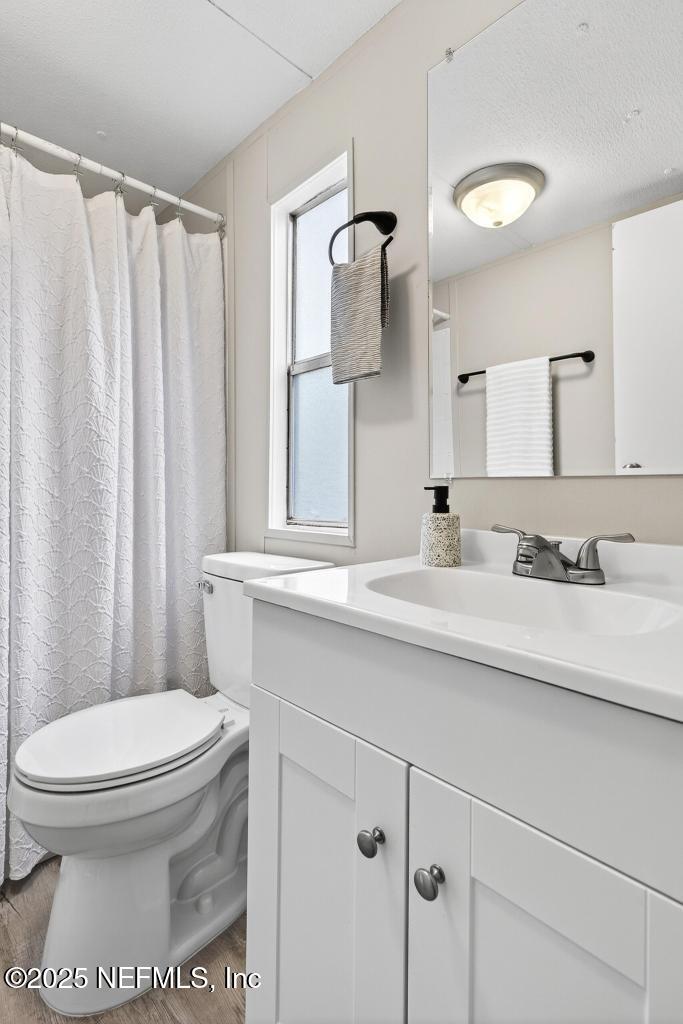 28 Neighbors Cove Road Orange Park, FL 32065 - Photo 47 of 56 a bathroom with a sink toilet and shower