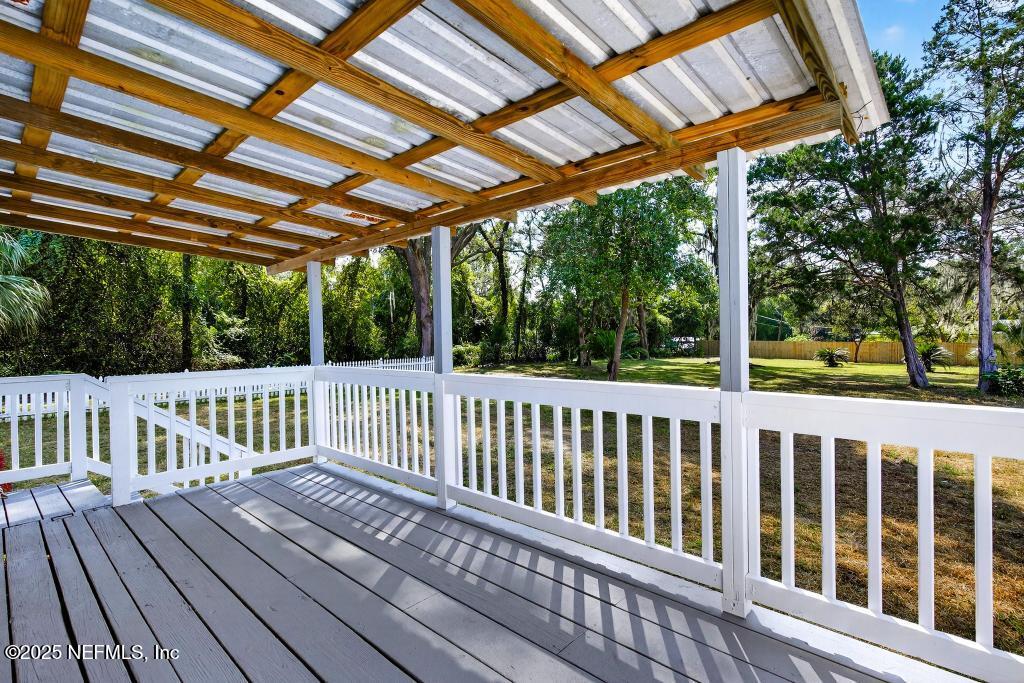 28 Neighbors Cove Road Orange Park, FL 32065 - Photo 7 of 56 a view of a wooden deck