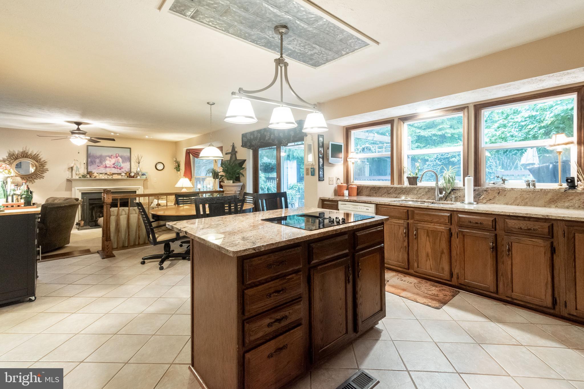 9387 Spring Water Path Jessup, MD 20794 - Photo 13 of 41 Kitchen w/ Island Seating