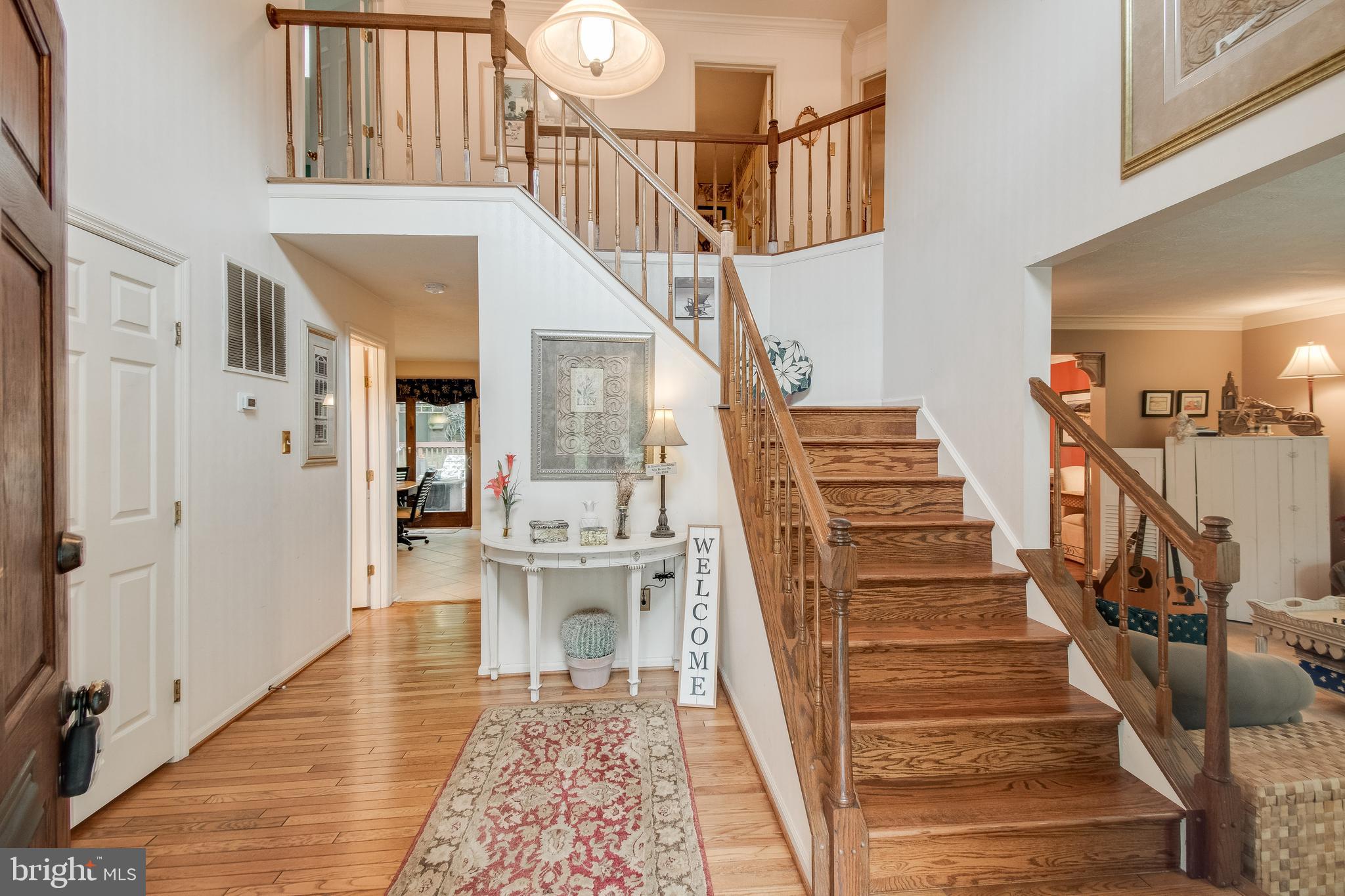 9387 Spring Water Path Jessup, MD 20794 - Photo 8 of 41 Foyer w/ Hardwood Floors