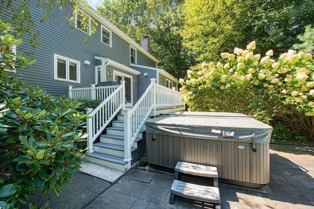 60 Aspen Road Sharon, MA 02067 - Photo 34 of 42 a view of backyard with deck and outdoor seating