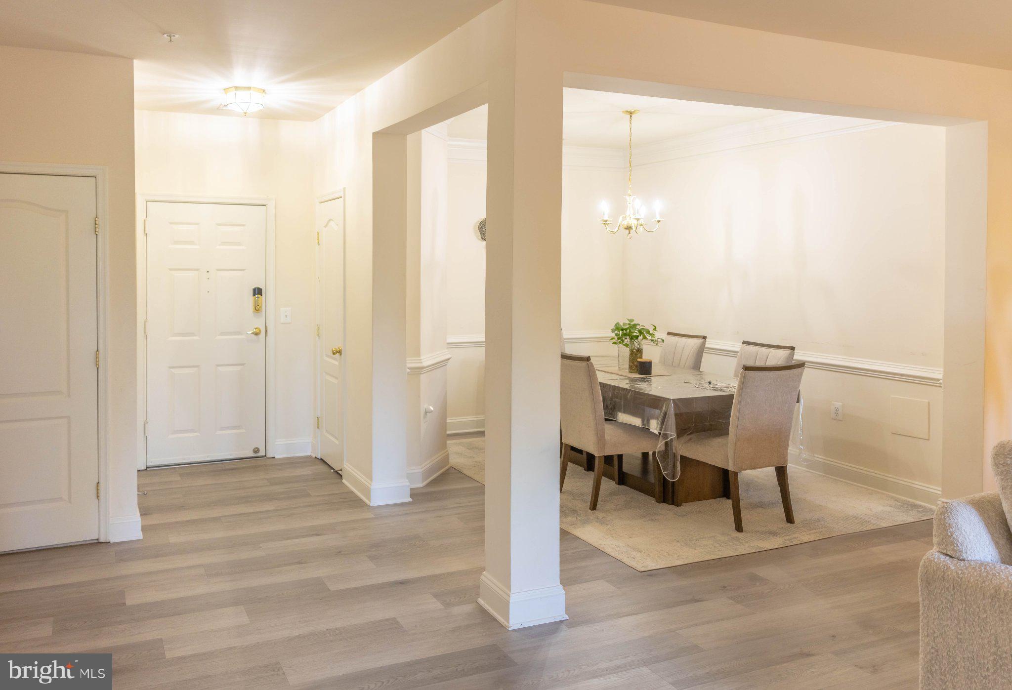 12824 Clarksburg Square Road, Unit 105 Clarksburg, MD 20871 - Photo 46 of 96 Spacious entryway with dining area.