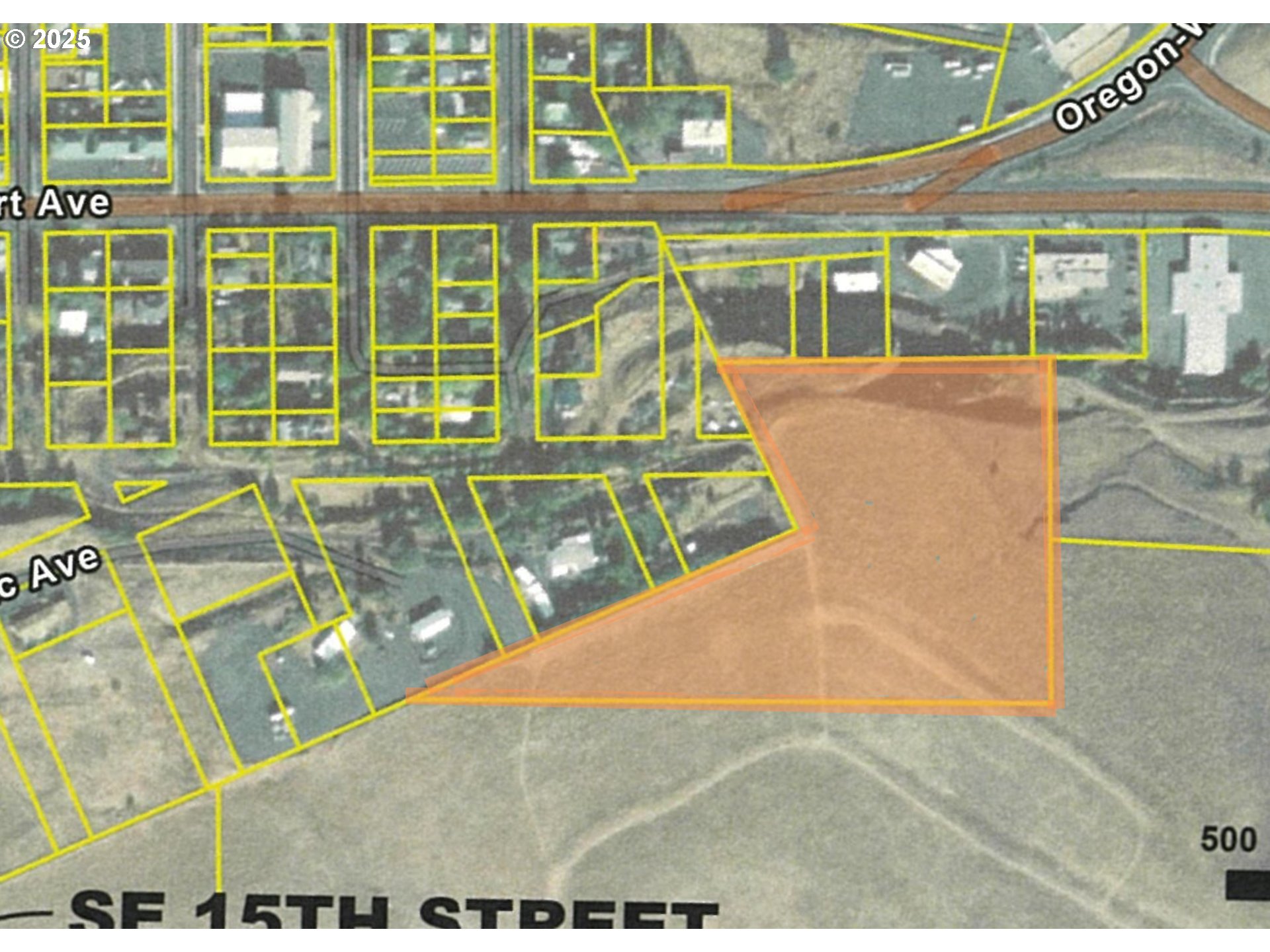 a view of a living room and a floor to ceiling window