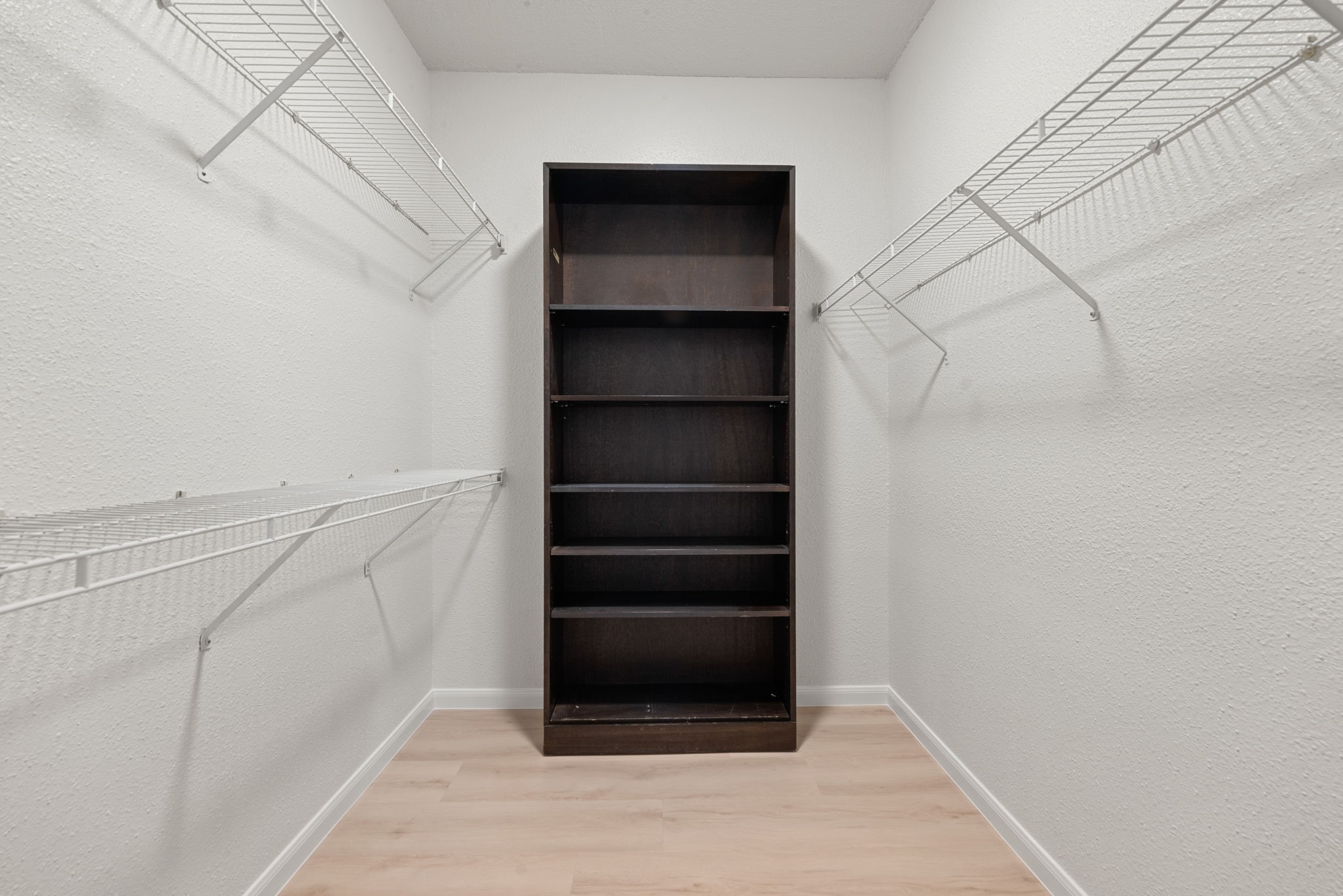 5711 Sugar Hill Drive, Unit 69 Houston, TX 77057 - Photo 11 of 16 a view of walk in closet