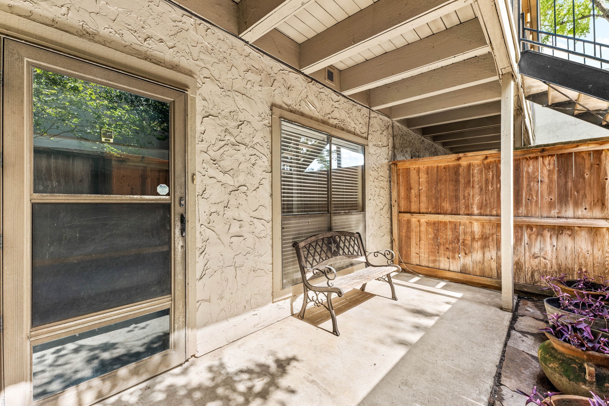 5711 Sugar Hill Drive, Unit 69 Houston, TX 77057 - Photo 15 of 16 a building outdoor space with patio furniture and potted plants