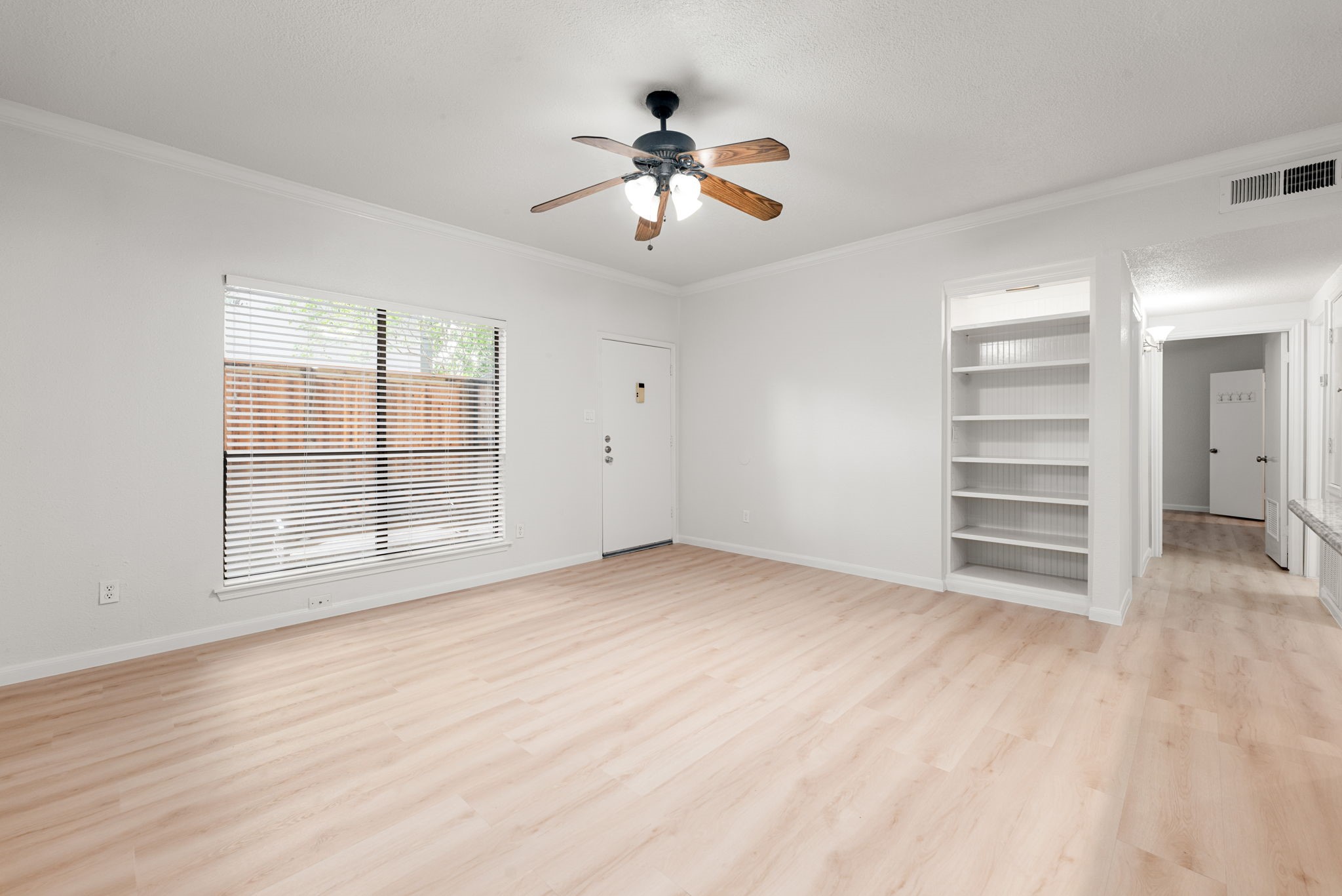 5711 Sugar Hill Drive, Unit 69 Houston, TX 77057 - Photo 6 of 16 a view of an empty room with a window